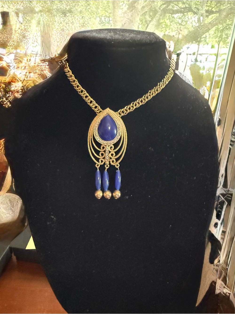 Gold-Tone Necklace with Blue Teardrop Pendant